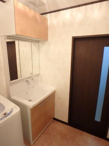 洗面所が広くなり洗濯機が使いやすくなった 株 大信住器 リフォーム実例 費用 Toto