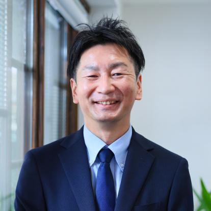 営業部課長 本社・武蔵野店 店長 田中 肇